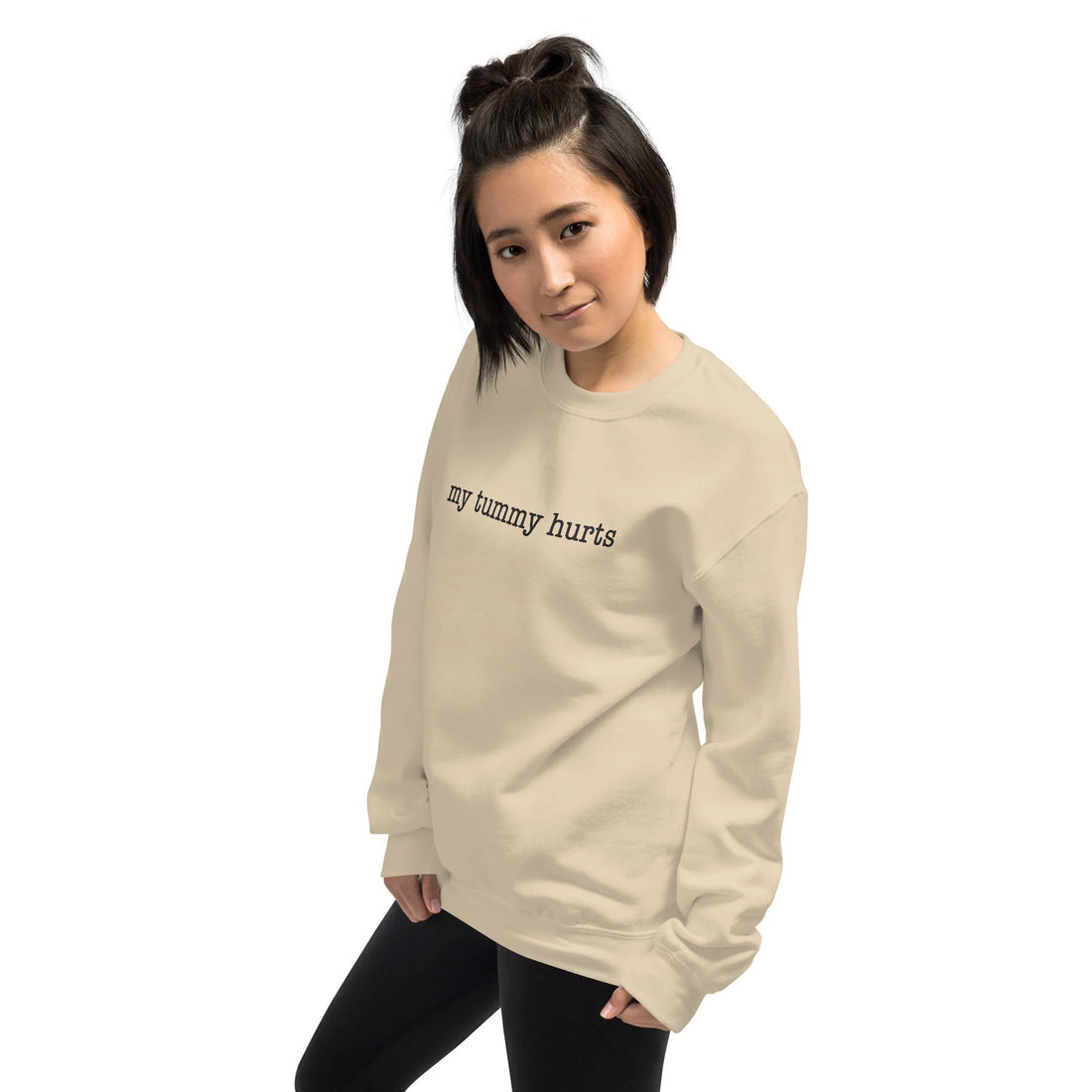 Comfort with a Dash of Humor: The Story Behind the 'My Tummy Hurts' Embroidered Unisex Sweatshirt